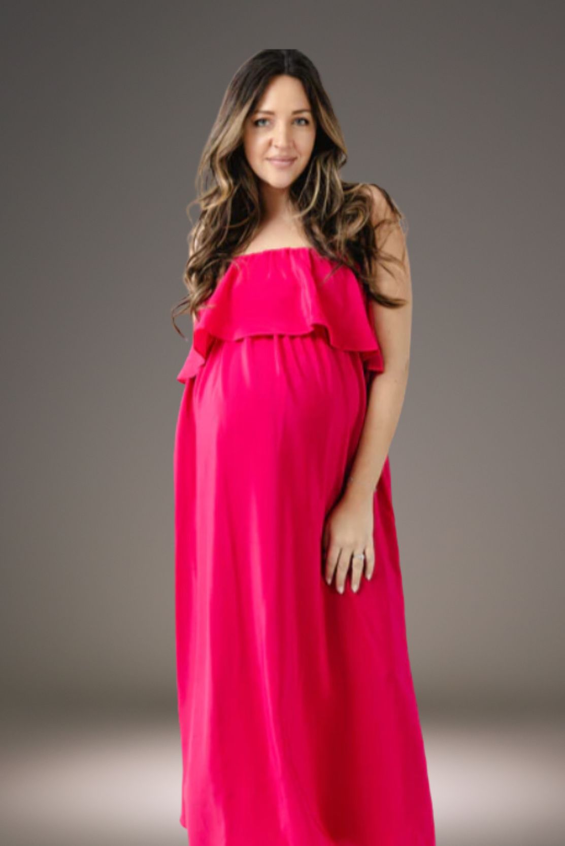 Statement pink Maternity occasion dress that is also versatile style by luxury pregnancy design brand CARI