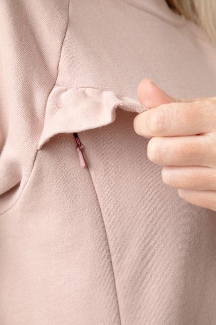 Breastfeeding Sweatshirt in Rose. Fashion meets functionality with this beautiful feminine style breastfeeding sweatshirt for new mums. Organic cotton soft against both yours and baby's skin. Concealed zips under the ruffle, open for perfect feeding access for your baby.
