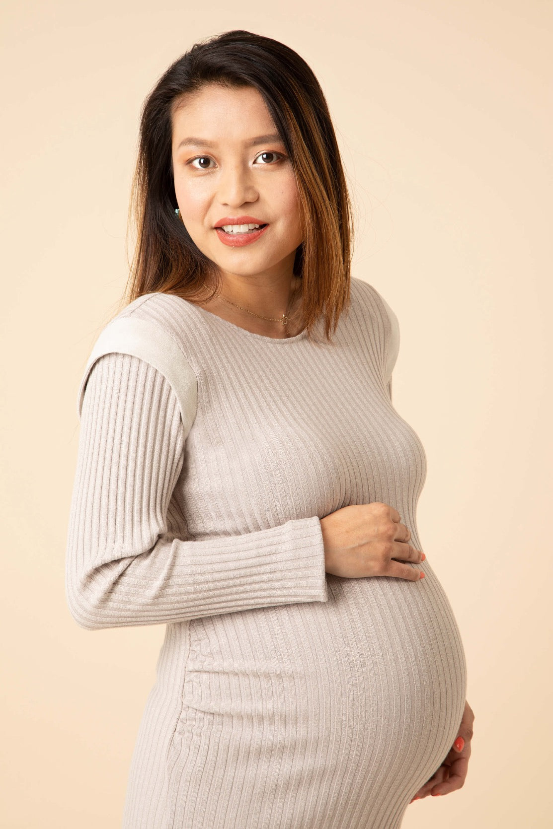 This maternity dress is a must-have for every stylish maternity wardrobe. Made in skin-soft fabric that hugs your growing curves in the right places. Discreet ruching gives the ‘perfect fit’ bump silhouette. Great occasion wear maternity dress and a perfect modern maternity office wear dress. Takes you from day to evening