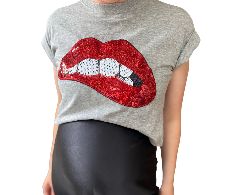 Summer statement cropped maternity t-shirt designed to sit above the bump, this is the ultimate statement maternity top for ‘cool mums’. It’s flattering boxy shape with rolled-sleeves is bump friendly, breastfeeding friendly and you will be wearing it long after pregnancy.