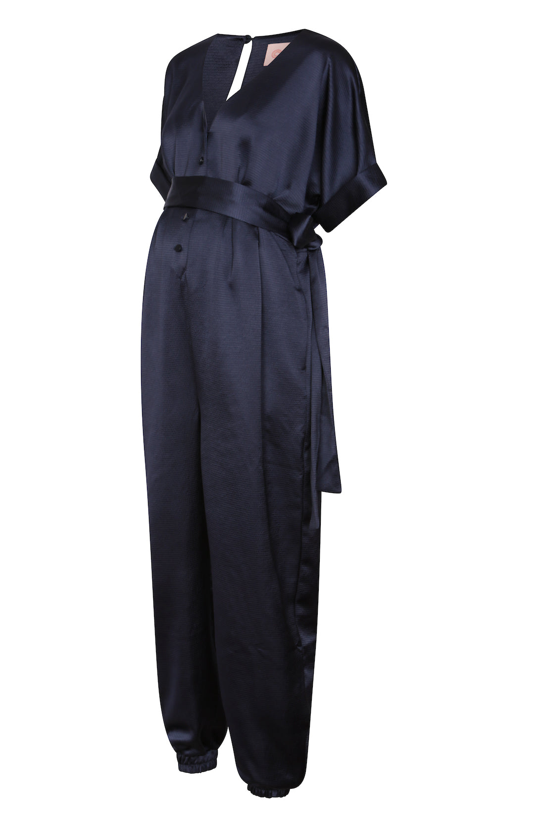 Harem-style maternity and breastfeeding jumpsuit for dressed-up occasions that will take you from day-to-night and bump-to-baby and beyond. An elevated take on the maternity jumpsuit that is so easy-to-wear for bumps, breastfeeding and afterwards. The v-neck and buttons offer a breastfeeding-friendly jumpsuit option, while the loose fit and cuffed trousers is so flattering post-pregnancy.