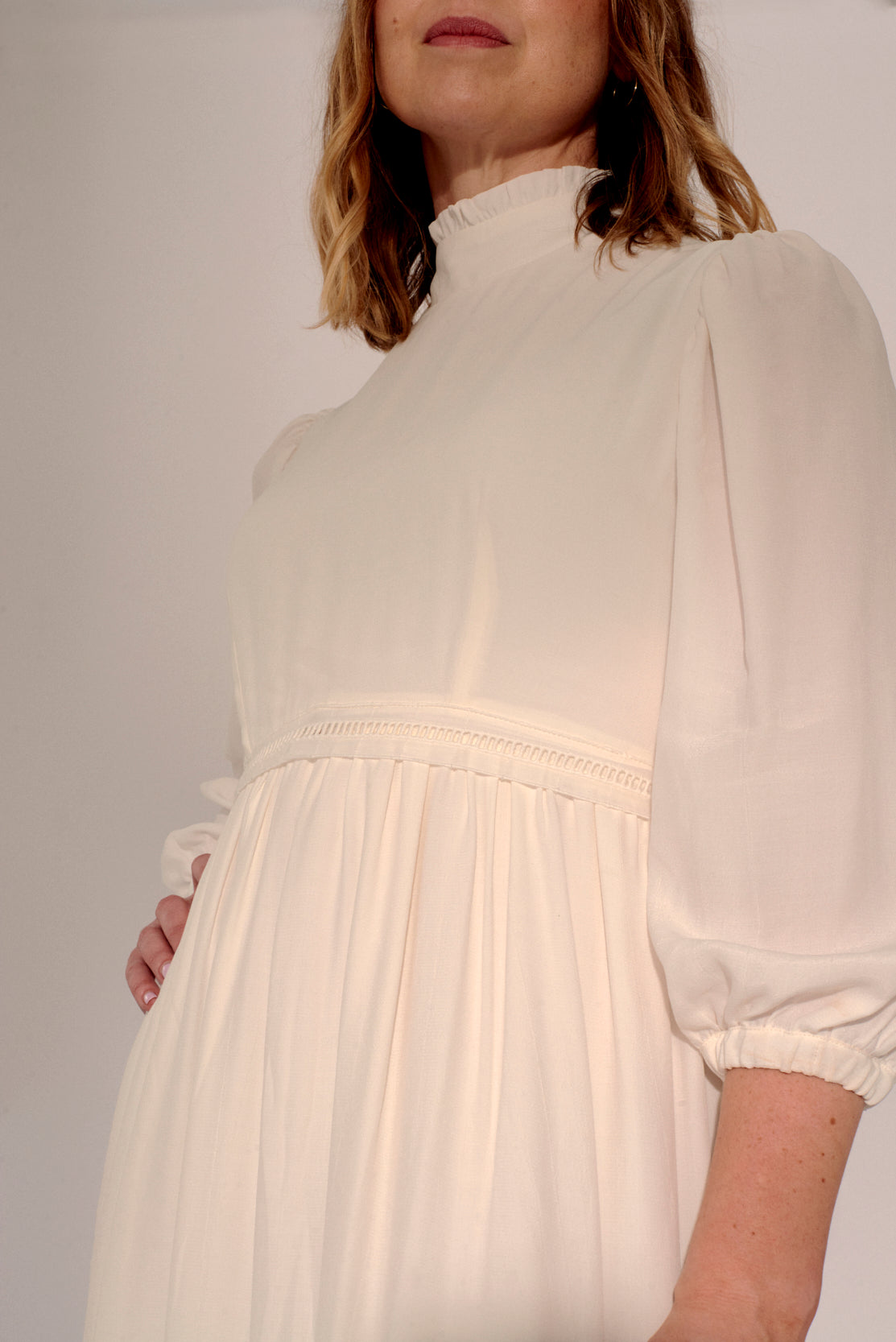 Elegant ivory Maternity dress & breastfeeding occasion wear dress that offers discreet nursing for new mothers at special events such as christening baptism baby naming or religious ceremonies occasions - elegant style, luxury deign brand for maternity clothes and postpartum new mother essentials UK  Ireland