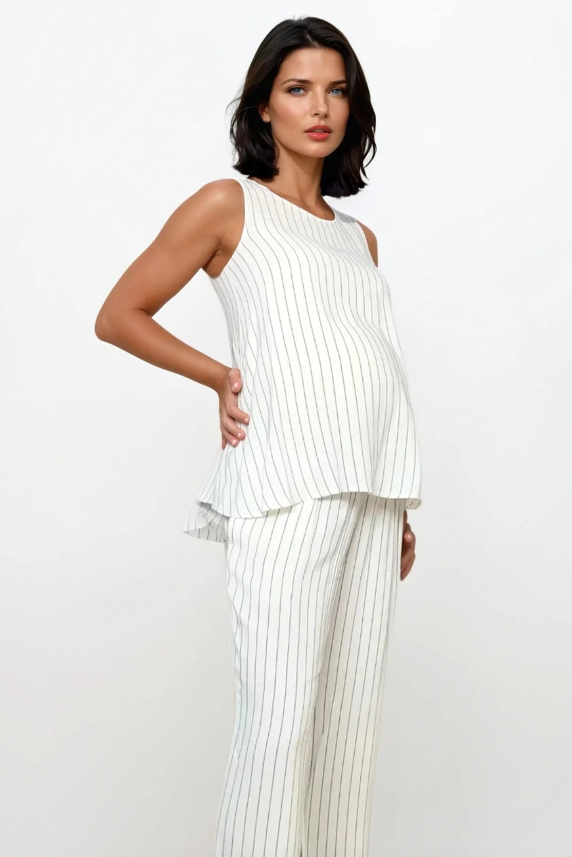 Pinstripes maternity co ord set - tailored trousers & matching top, smart business suit for a pregnant financial professional capsule wardrobe essential autumn style