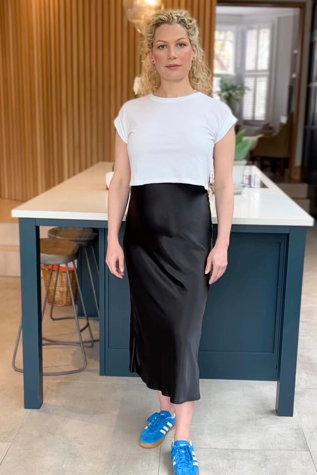 A great shape white cotton t-shirt that is bump-friendly and looks good during pregnancy that is non-maternity